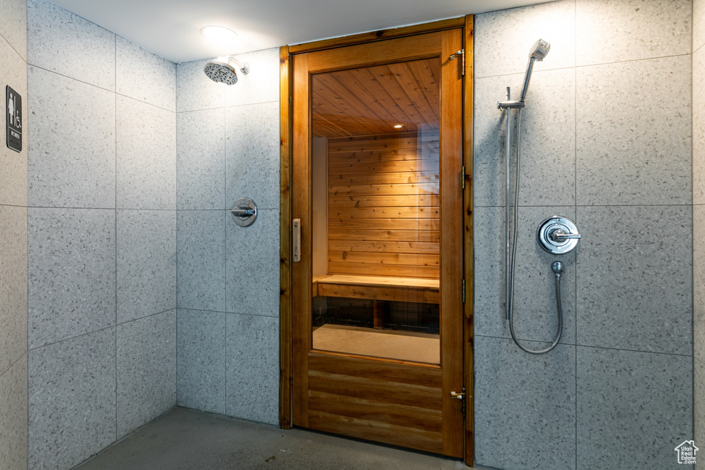 Sauna / steam room featuring concrete flooring