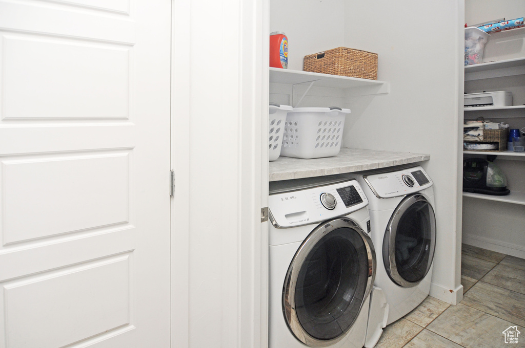 Laundry area featuring washer and clothes dryer