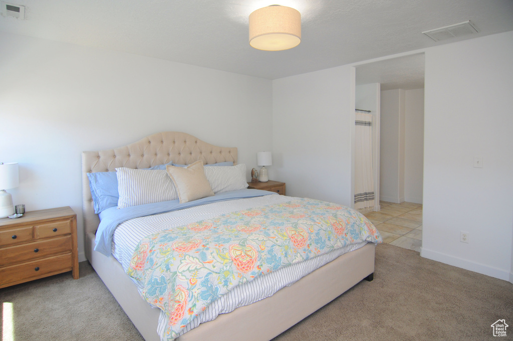 Bedroom featuring carpet