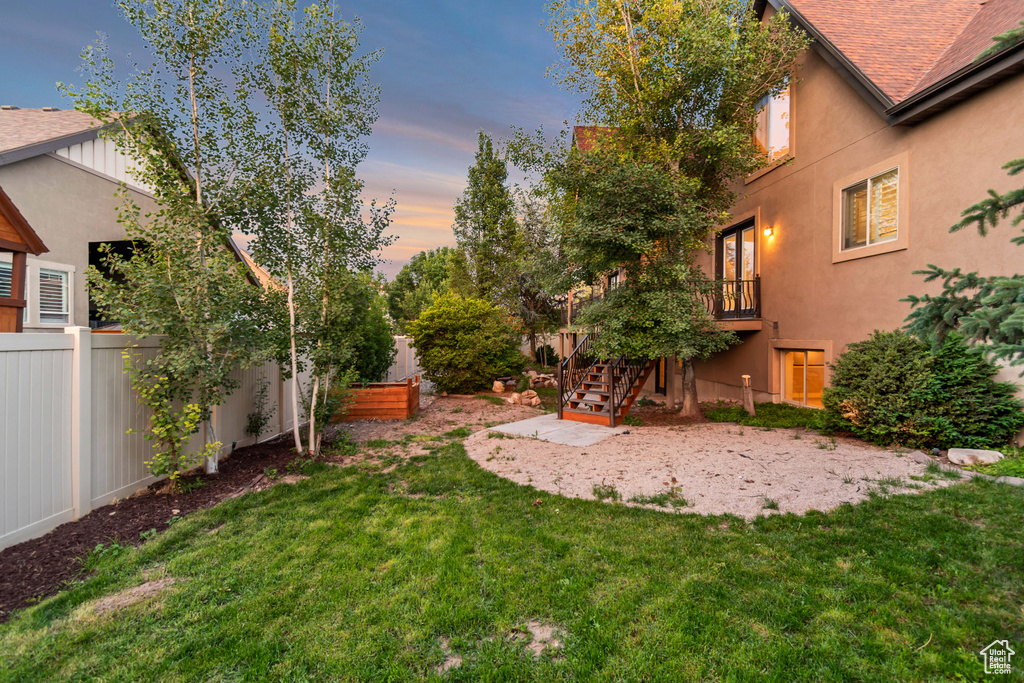 Yard at dusk with stairway