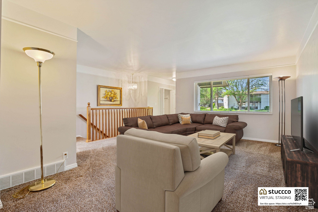 Living room with carpet flooring and baseboards