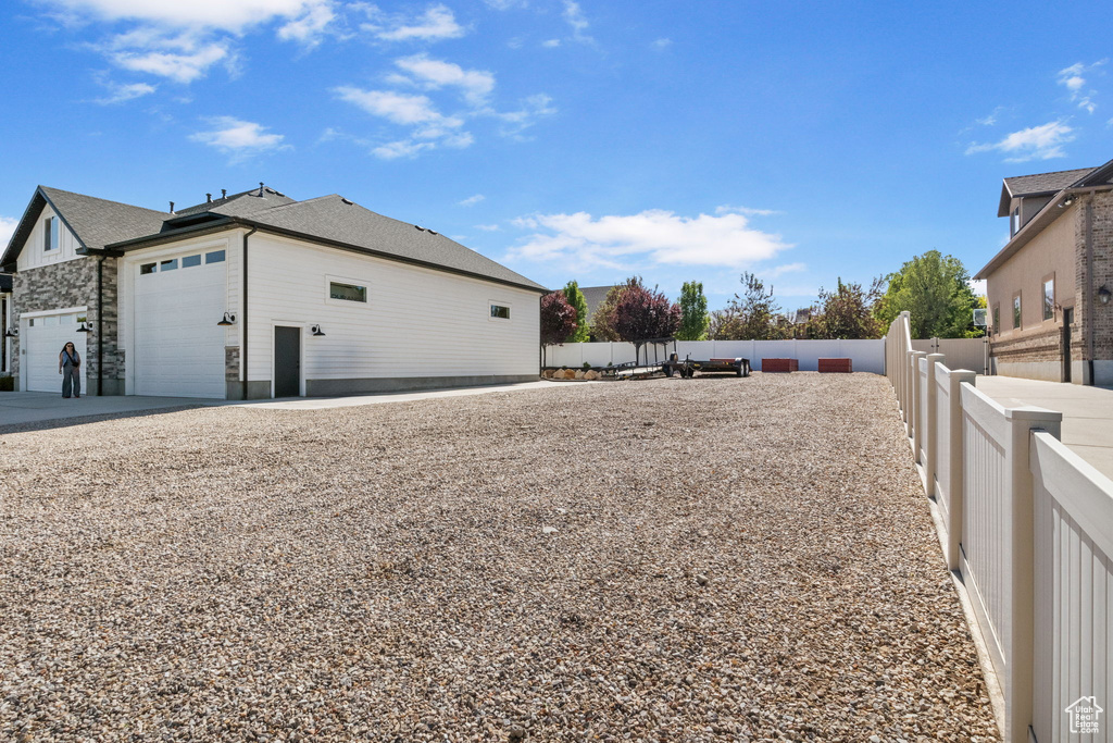 View of home\\\\\\\'s exterior featuring a garage