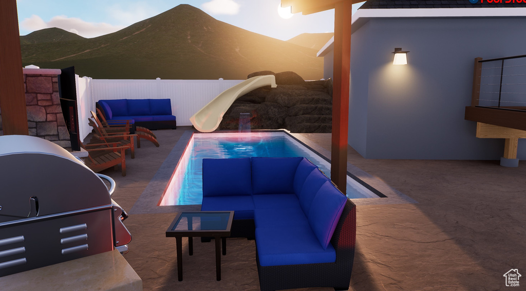 View of pool featuring an outdoor living space, a patio area, and area for grilling