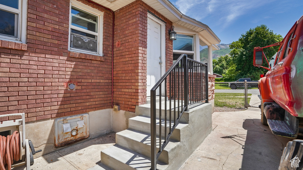 Property entrance with brick siding