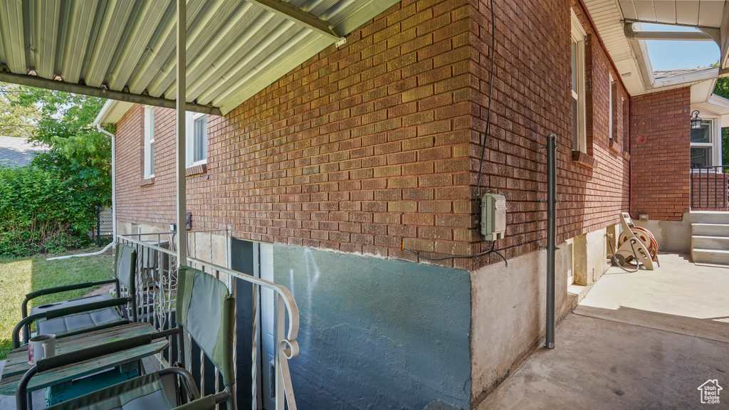 View of home's exterior with brick siding