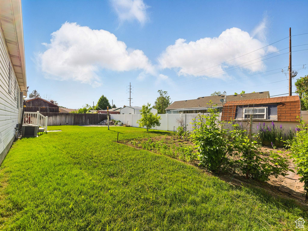 View of yard featuring central AC