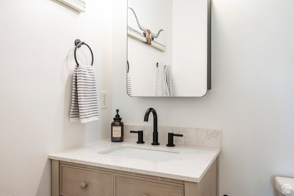 Half bath featuring vanity