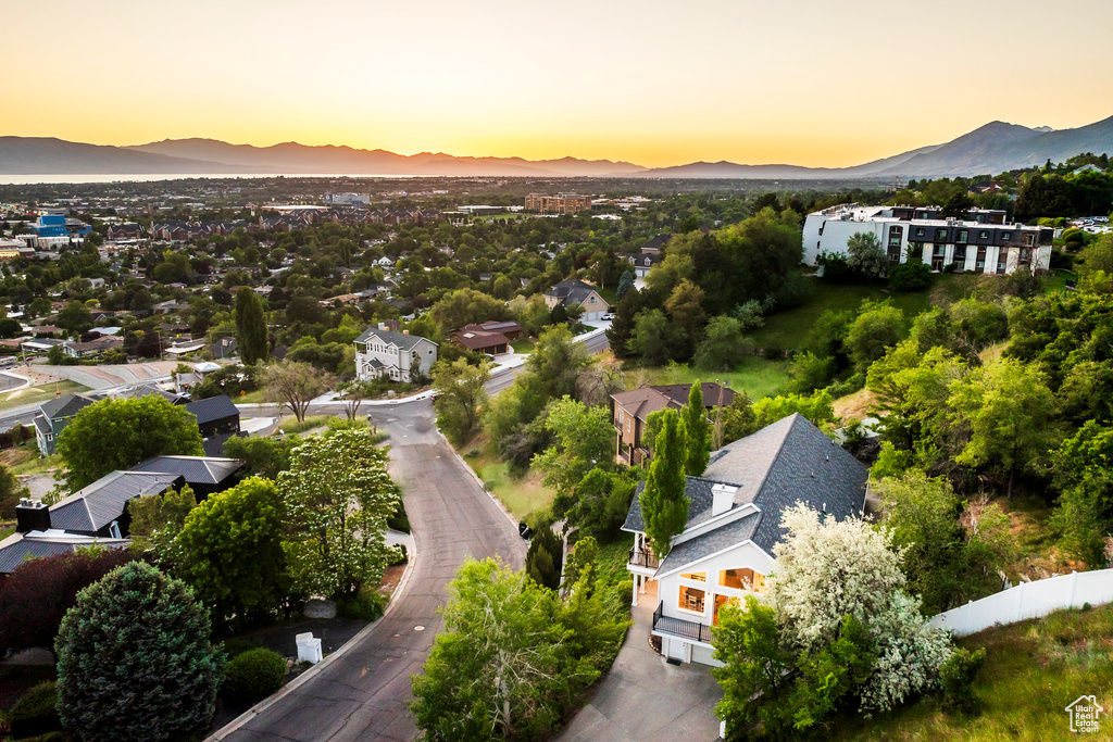 Aerial view at dusk of a mountain view and a residential view