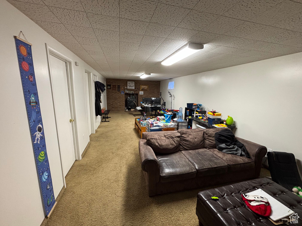 Living area with carpet flooring