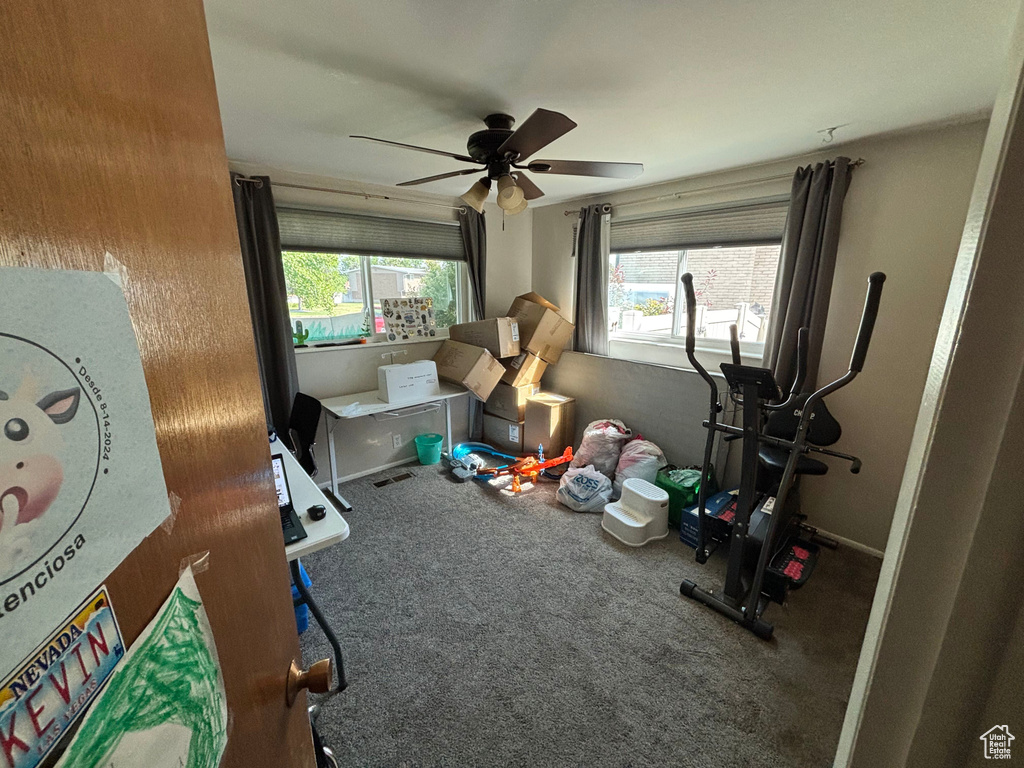 Game room featuring carpet flooring and ceiling fan