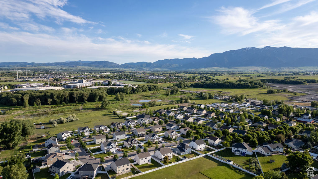 Aerial overview of property's location with mountains