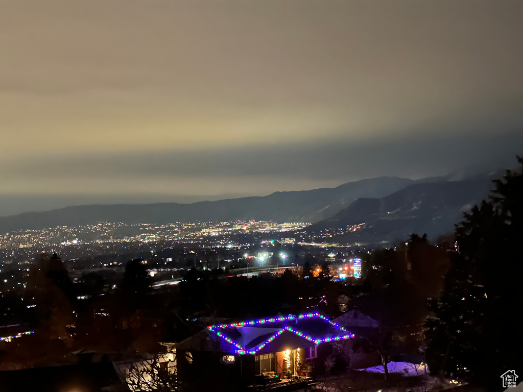 View of city with mountains and a view of city lights