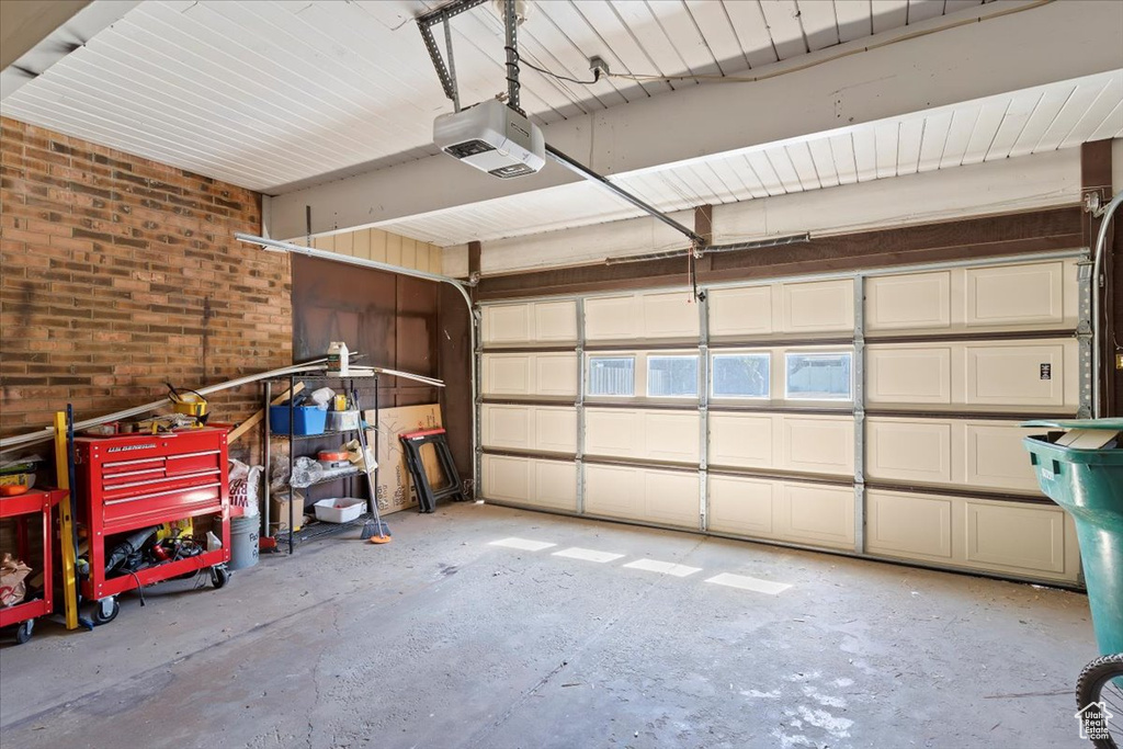 Garage featuring a garage door opener