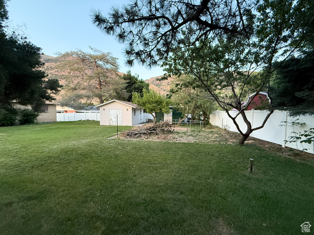 View of yard with a mountain view