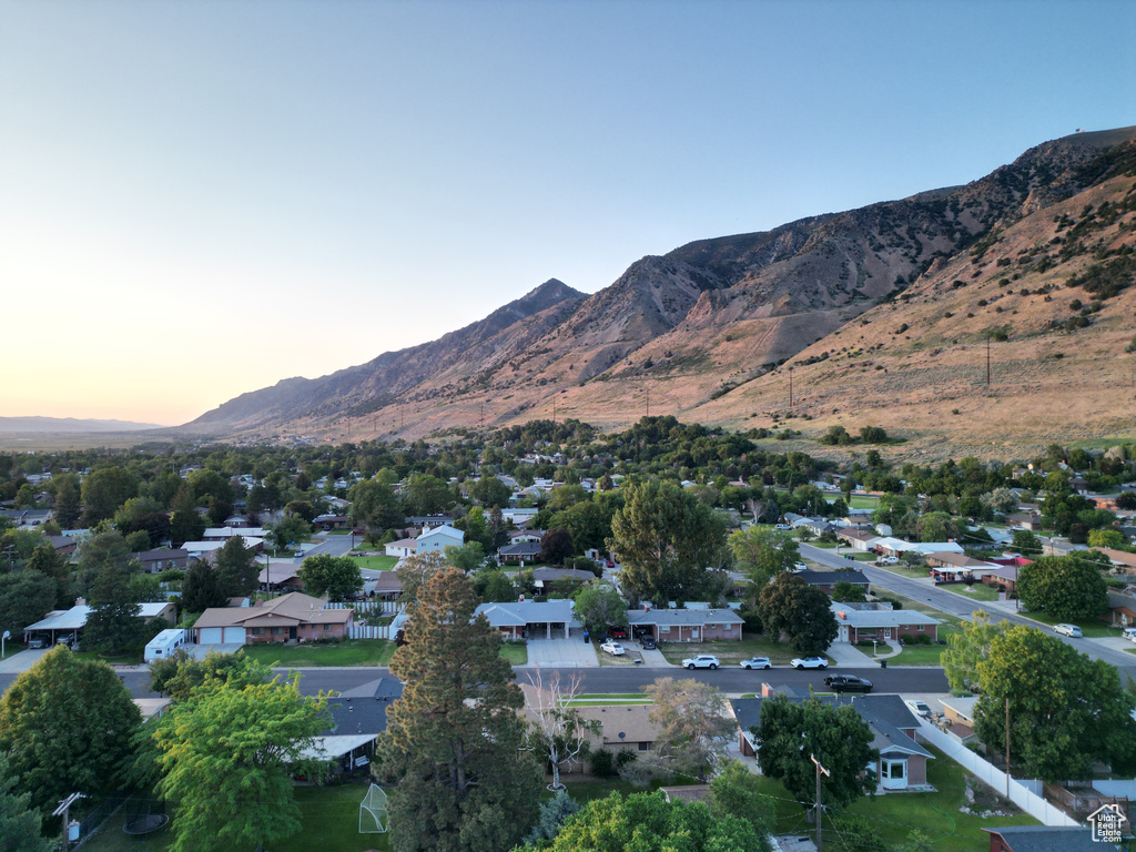 Aerial view at dusk of a mountain view and a residential view