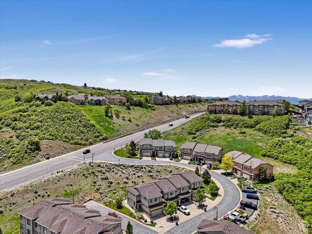 Aerial view of residential area featuring mountains