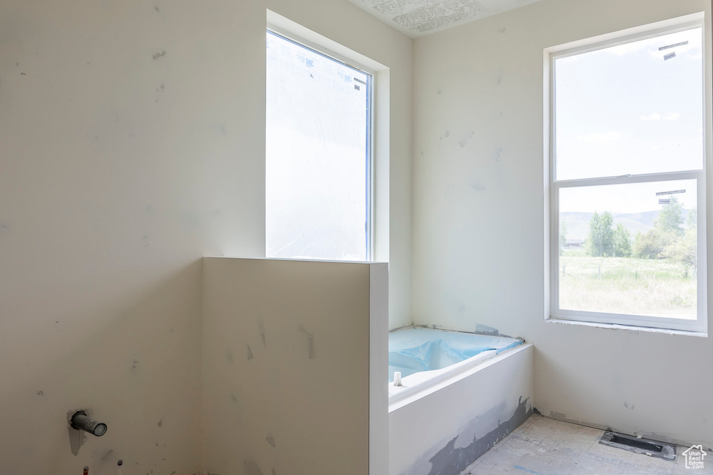 Bathroom featuring a garden tub