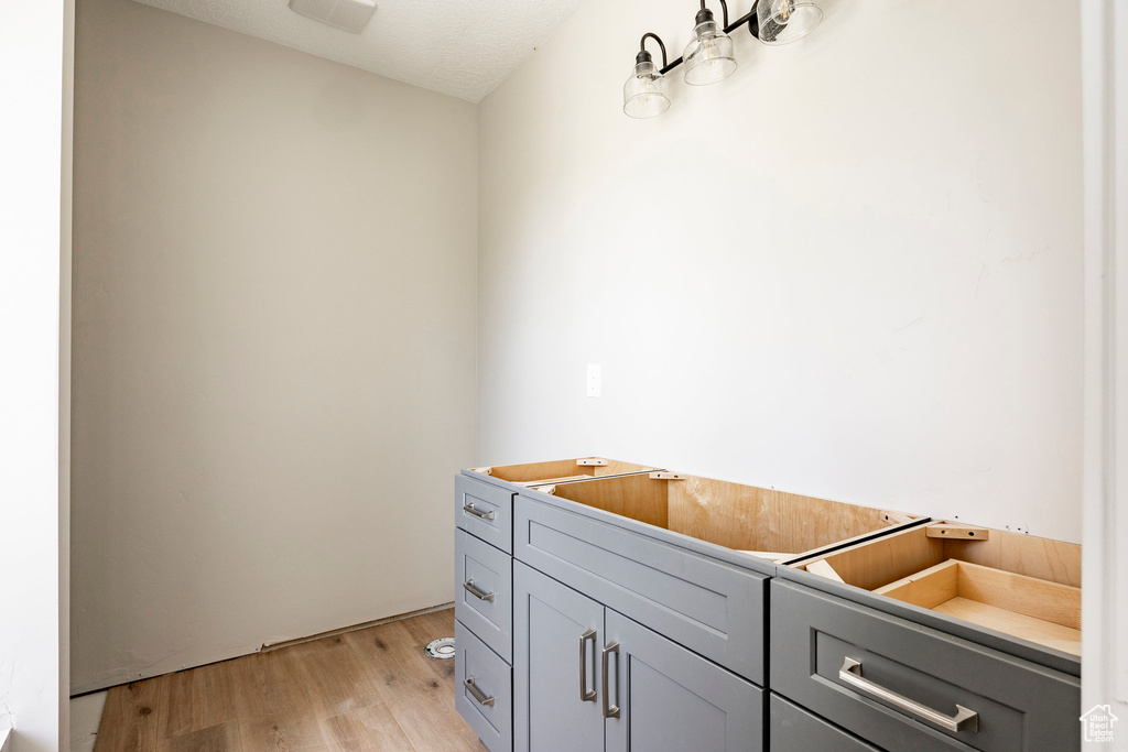 Bathroom featuring wood finished floors