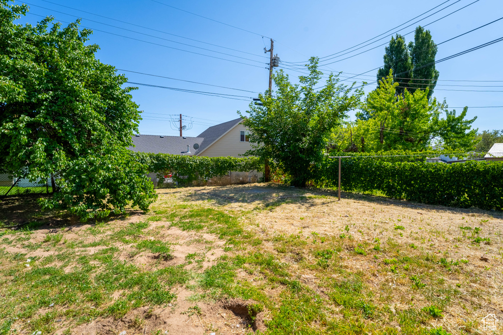 View of fenced backyard