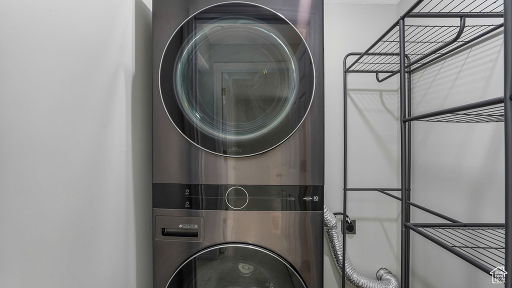 Washroom with stacked washing machine and dryer