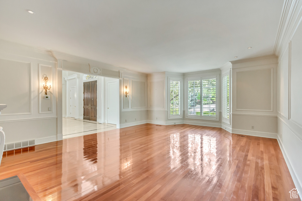 Spare room with light hardwood / wood-style floors