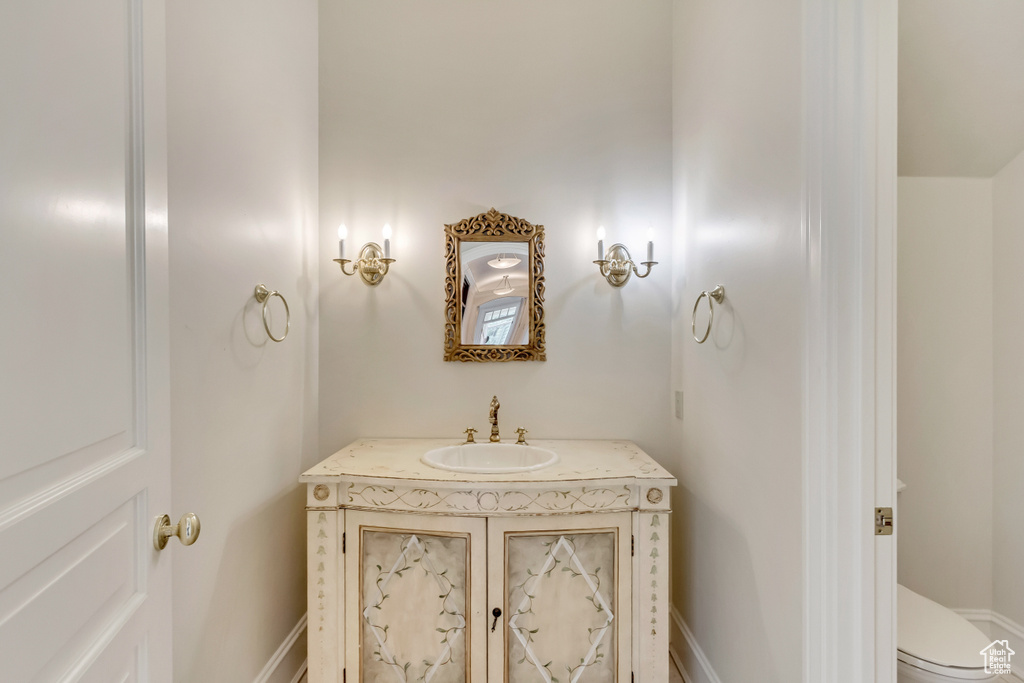 Bathroom featuring toilet and vanity