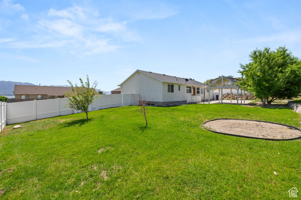 View of yard with a gazebo and a patio