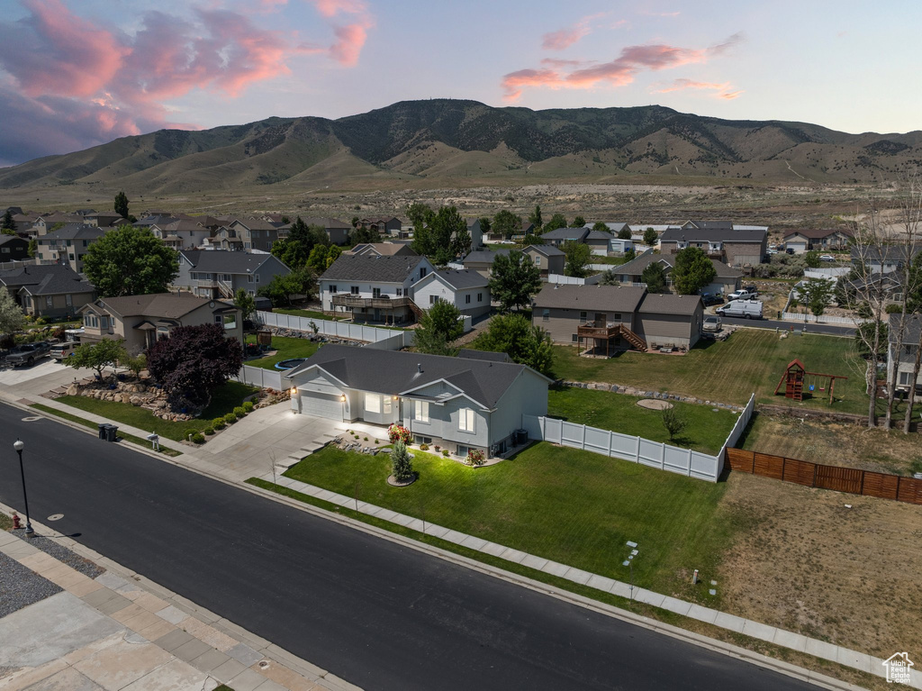 View of mountain background featuring nearby suburban area