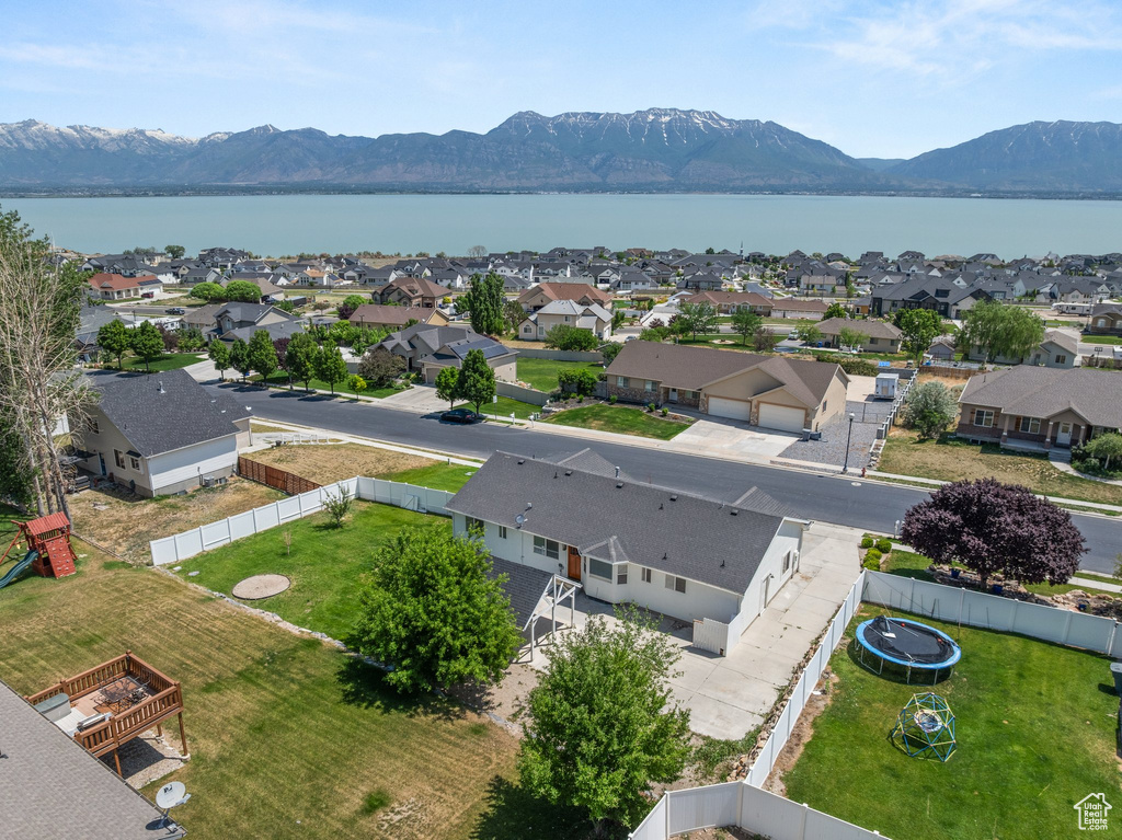 Aerial view of residential area with a water and mountain view