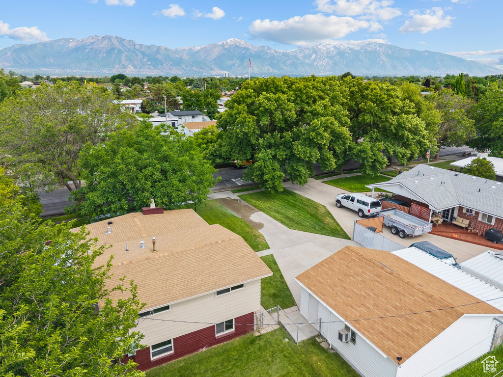 Aerial view of residential area with a mountainous background