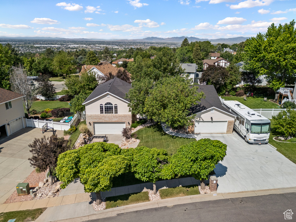 Aerial perspective of suburban area featuring mountains