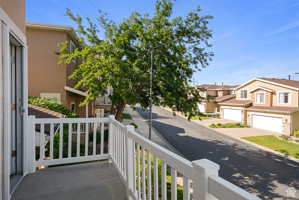 Balcony featuring a residential view