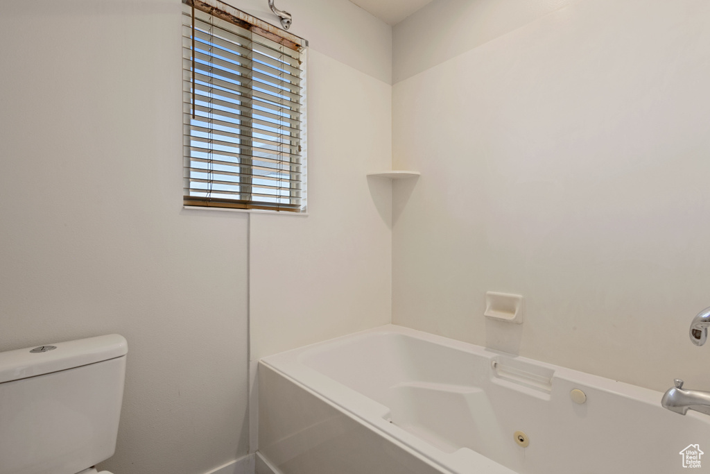 Full bathroom with toilet