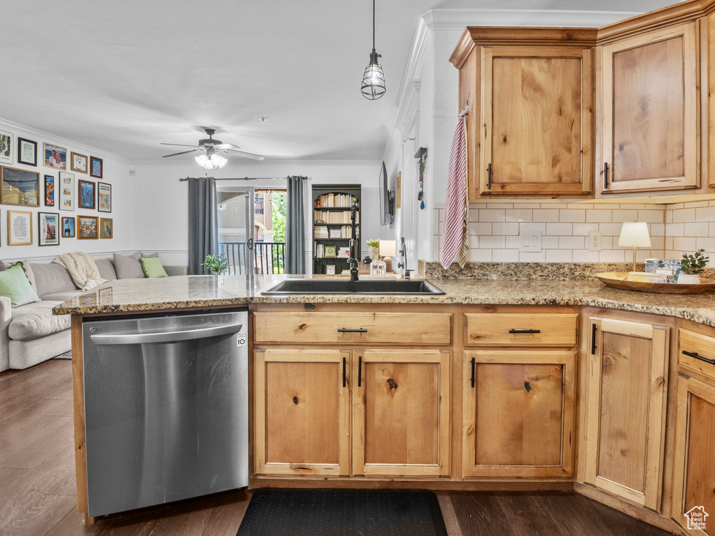 Kitchen with dishwasher, open floor plan, ornamental molding, dark wood finished floors, and tasteful backsplash