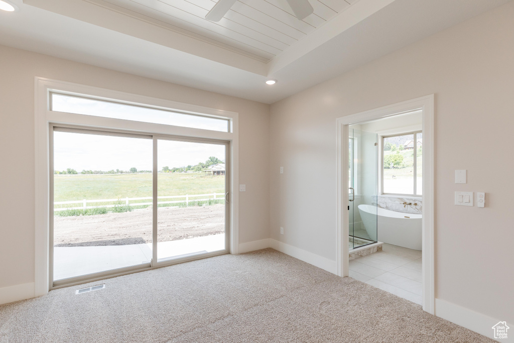 Empty room with carpet floors, a ceiling fan, recessed lighting, and baseboards