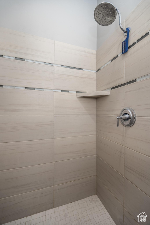 Full bath with tiled shower