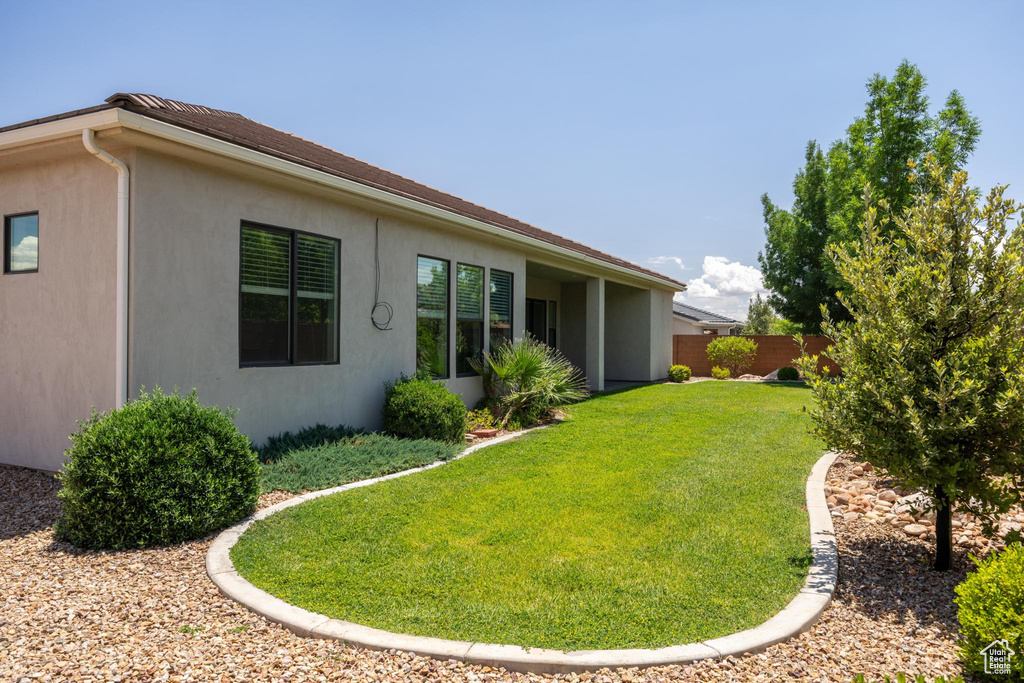 Back of property with stucco siding