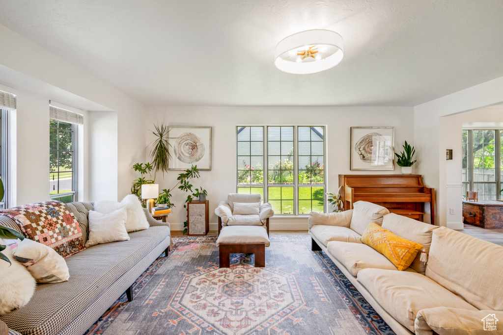 Living area featuring wood finished floors and baseboards