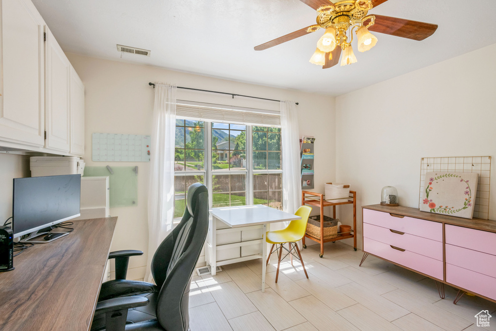 Office area with ceiling fan
