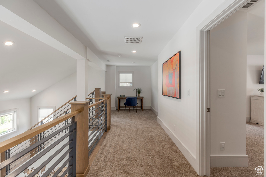 Corridor featuring recessed lighting, an upstairs landing, light carpet, baseboards, and an office area