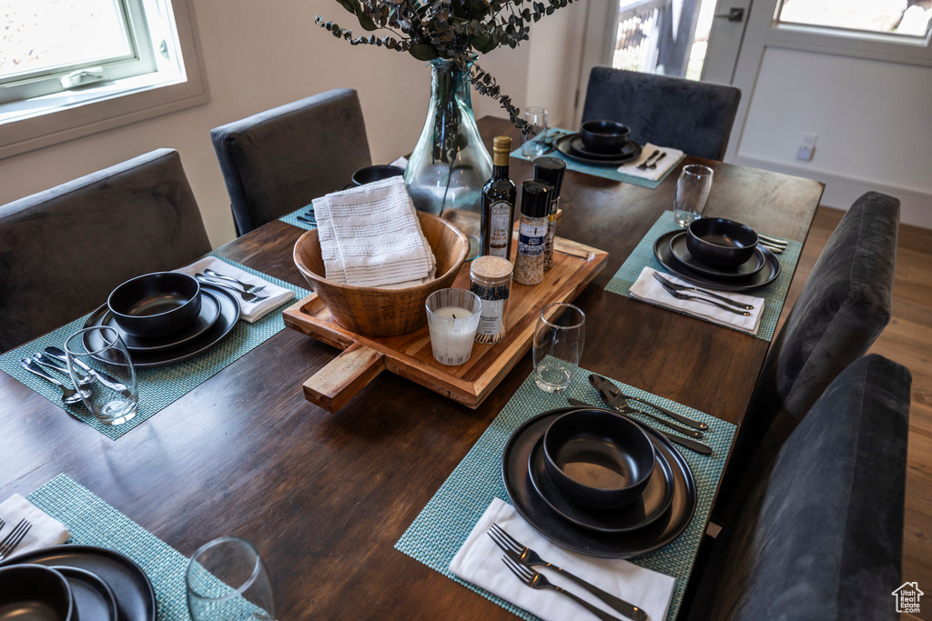 Dining area featuring healthy amount of natural light and wood finished floors