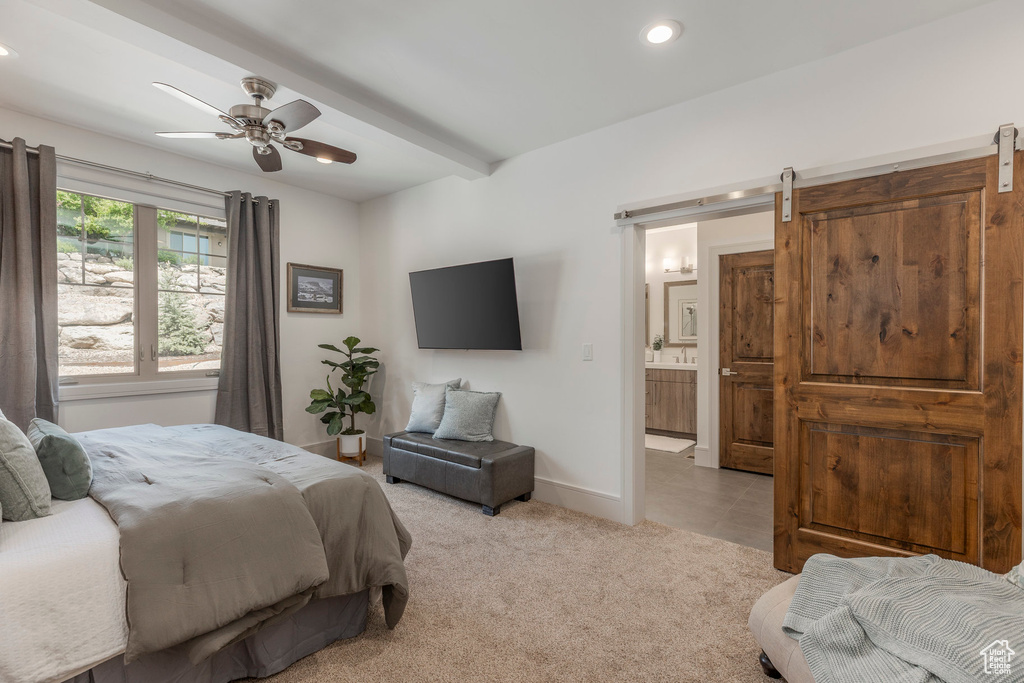 Bedroom featuring recessed lighting, baseboards, light carpet, a ceiling fan, and ensuite bath