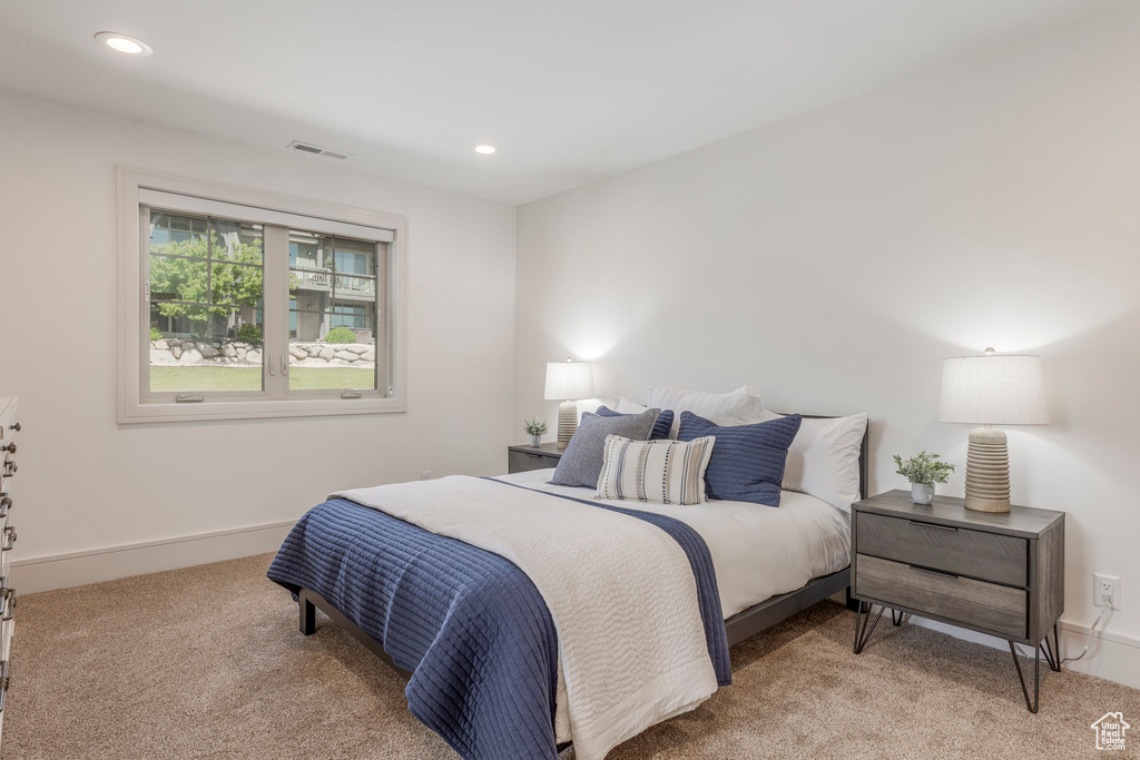 Bedroom with carpet, recessed lighting, and baseboards