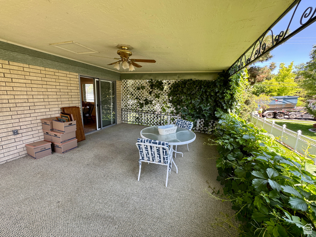 View of patio / terrace with ceiling fan