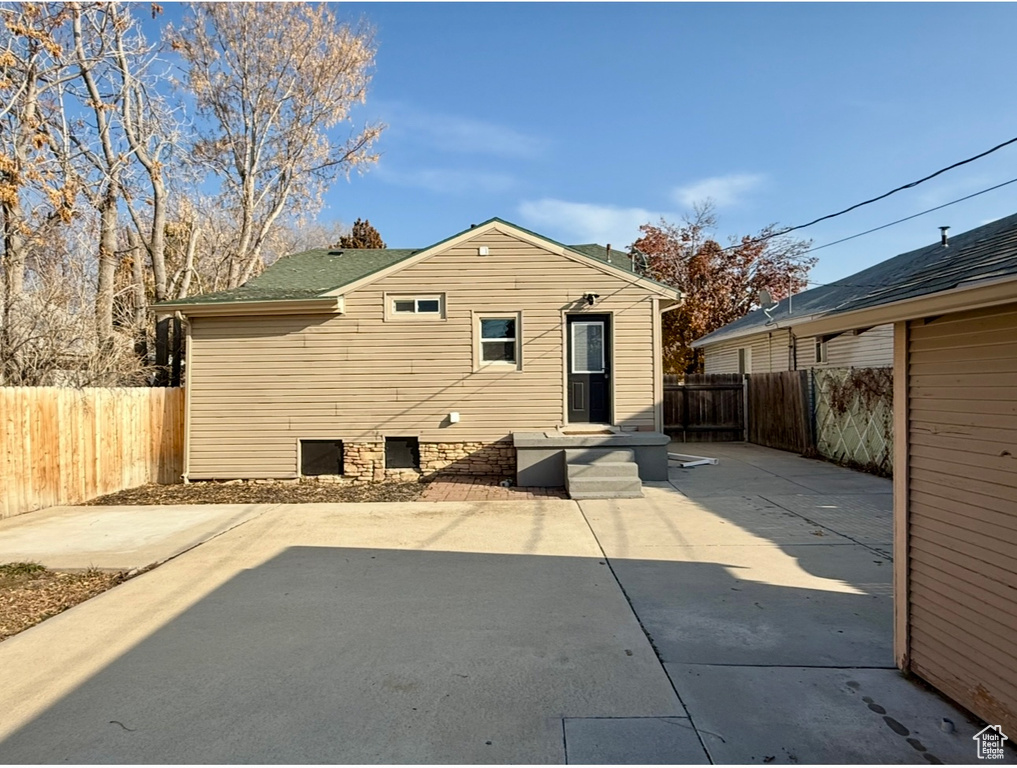Rear view of house featuring a patio area