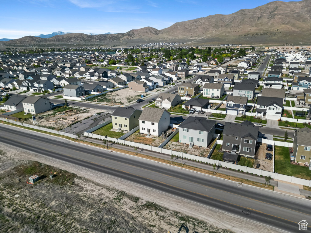Aerial view of property\\\'s location with nearby suburban area and mountains