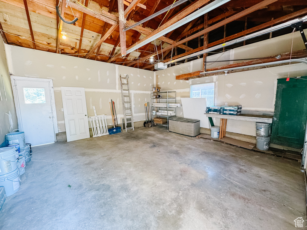 Garage featuring a garage door opener