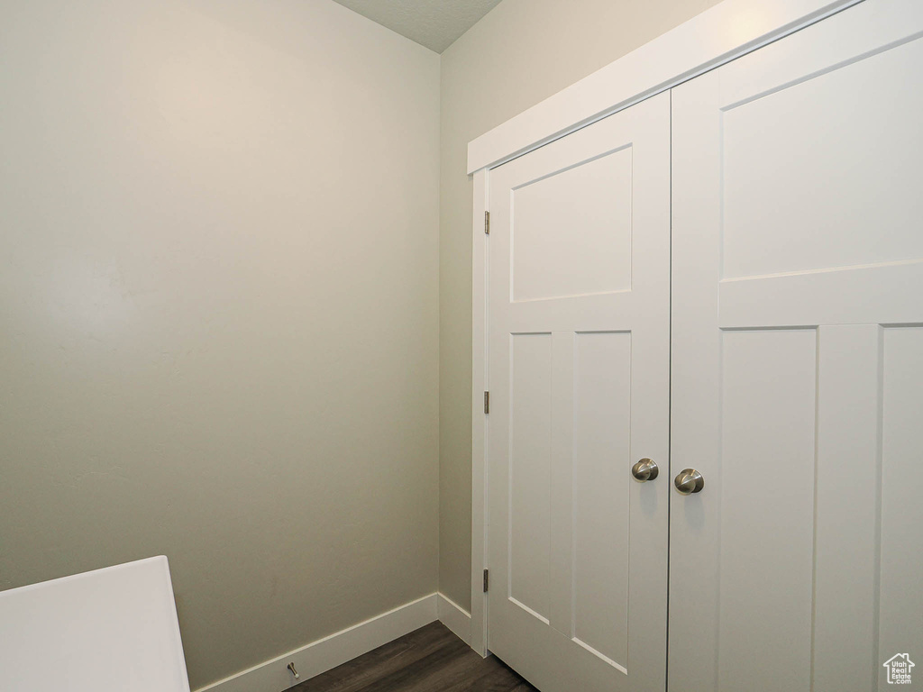 Interior space featuring wood finished floors and baseboards