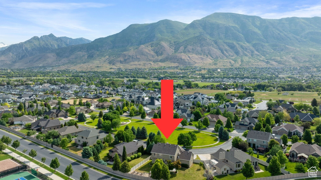 View of mountain backdrop with nearby suburban area