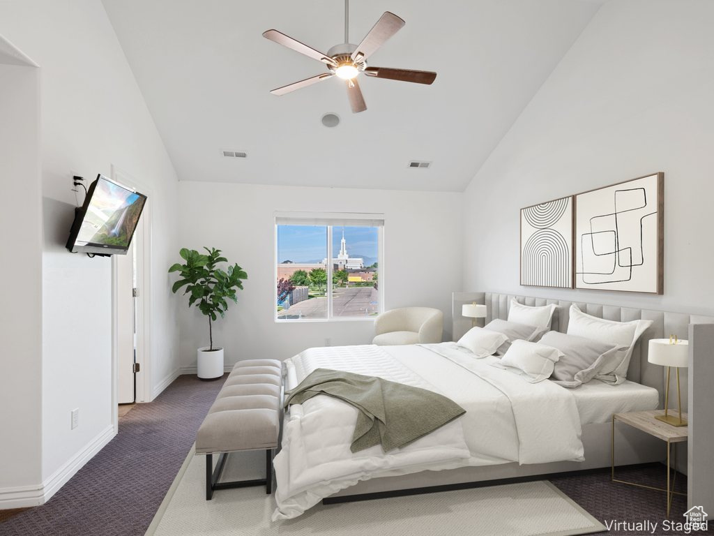Carpeted bedroom featuring high vaulted ceiling, ceiling fan, and baseboards